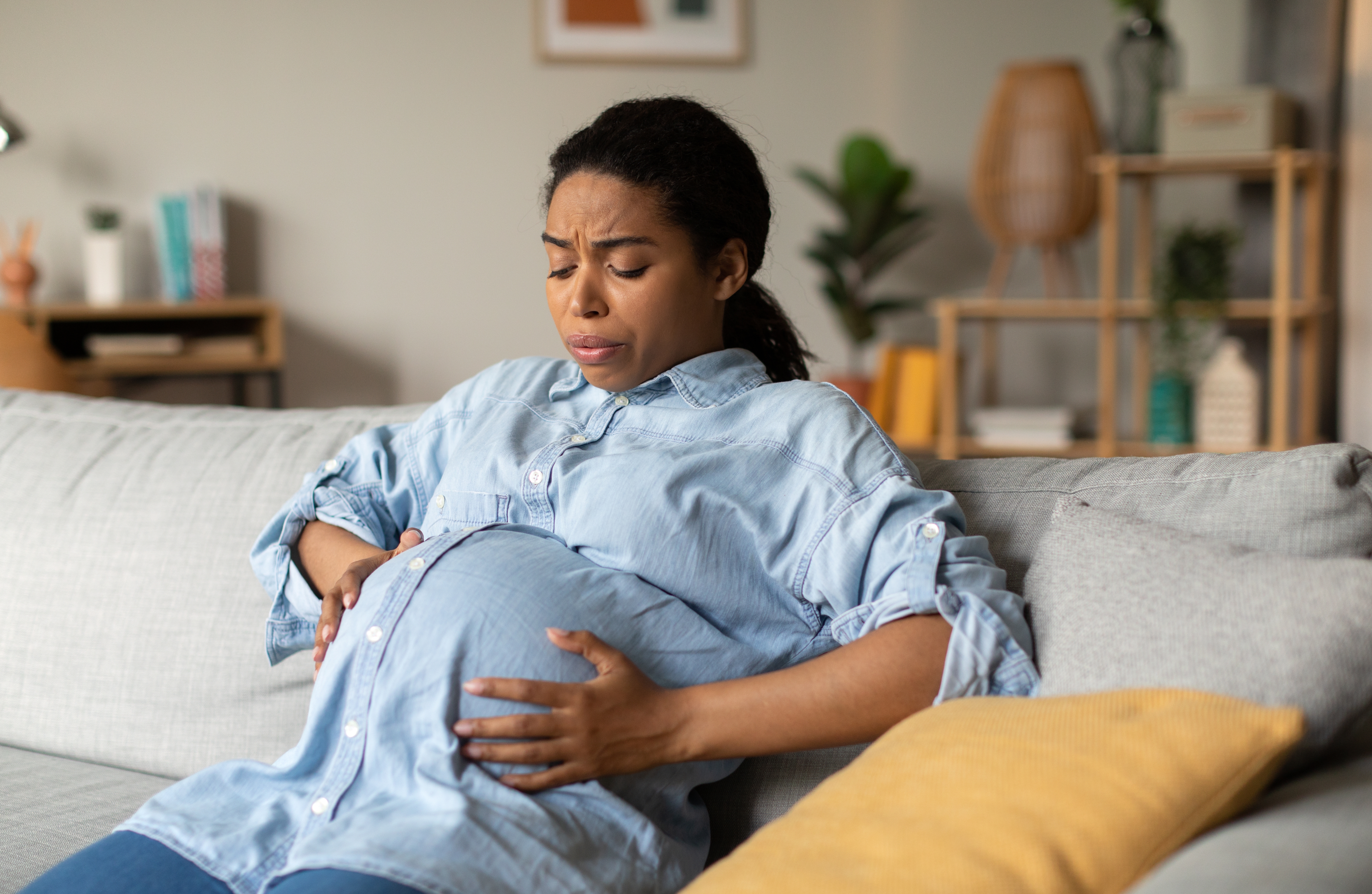 Pregnant,African,Woman,Suffering,From,Pain,Having,Spasm,At,Home