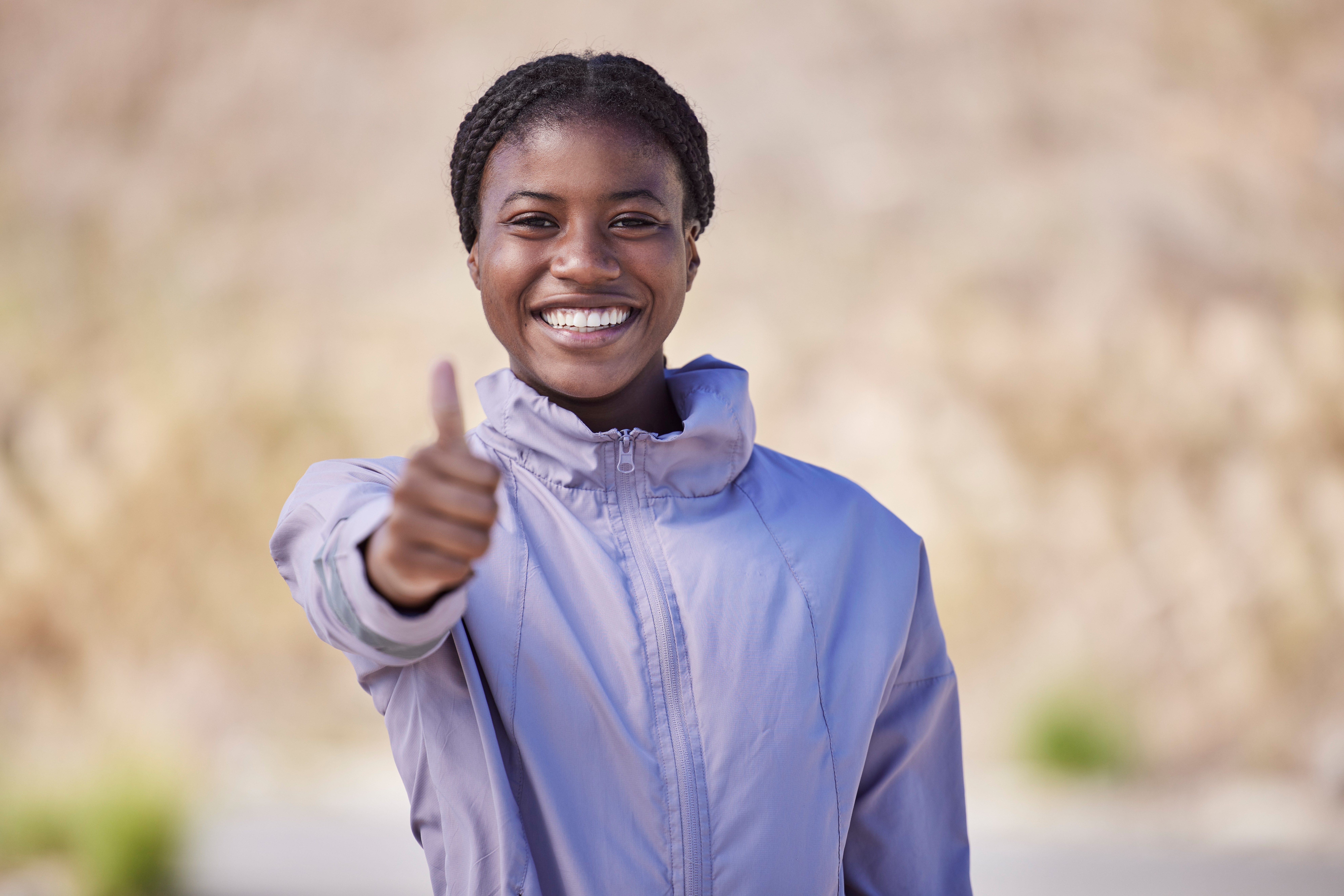 Portrait,,Thumbs,Up,And,Black,Woman,Outdoor,,Training,And,Exercise